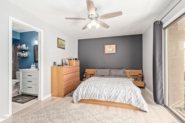 bedroom with ceiling fan and light hardwood / wood-style flooring