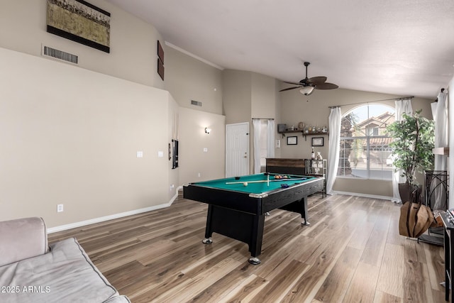 playroom with pool table, visible vents, vaulted ceiling, wood finished floors, and baseboards