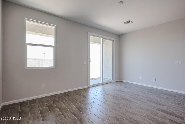 19320 N Diego Way, Maricopa, AZ 85138 - unfurnished room with dark wood finished floors and baseboards