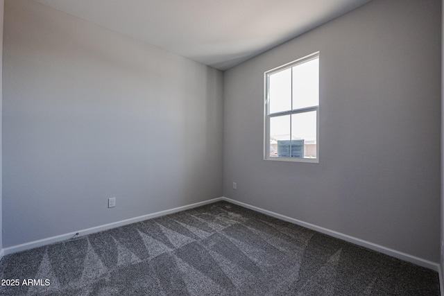 19320 N Diego Way, Maricopa, AZ 85138 - spare room with dark carpet and baseboards