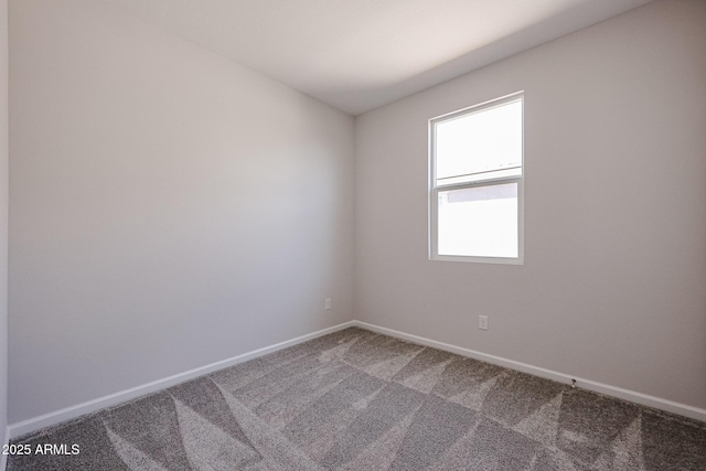 19320 N Diego Way, Maricopa, AZ 85138 - empty room featuring carpet and baseboards