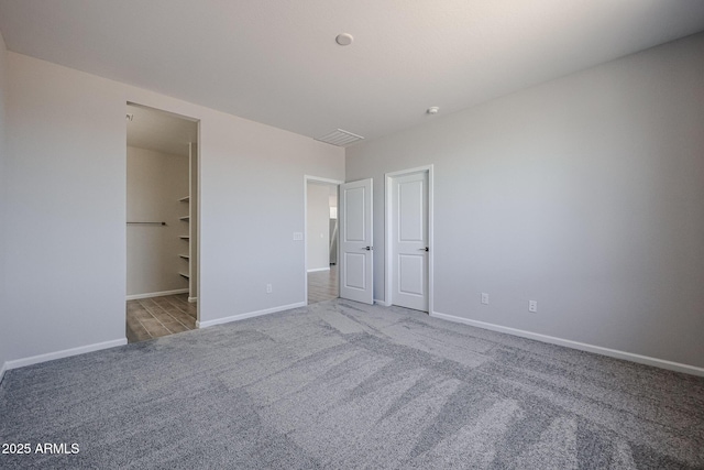 19320 N Diego Way, Maricopa, AZ 85138 - unfurnished bedroom with carpet and baseboards