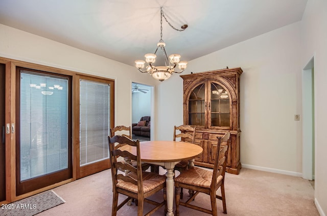 8355 E Via De Los Libros, Scottsdale, AZ 85258 - dining area with a chandelier and light colored carpet