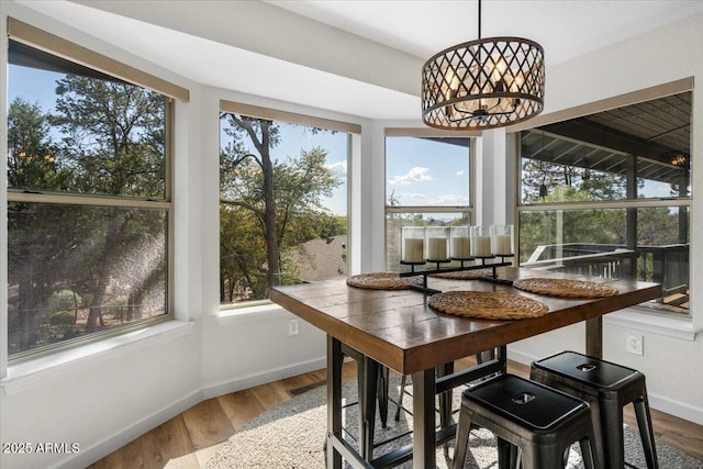 902 S Santa Fe Cir, Payson, AZ 85541 - dining area featuring a chandelier, baseboards, and wood finished floors