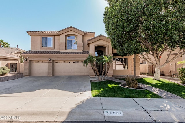 mediterranean / spanish-style house featuring a garage