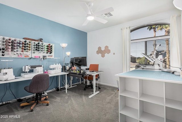 carpeted office featuring ceiling fan