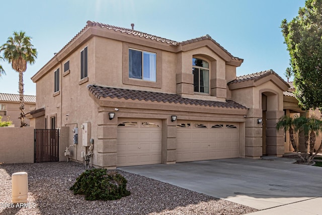 mediterranean / spanish-style home with a garage