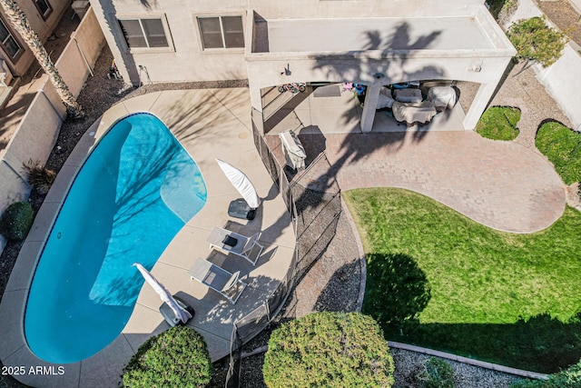 exterior space with a diving board and a patio area