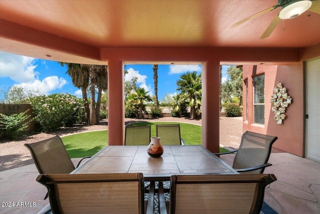 view of terrace featuring ceiling fan