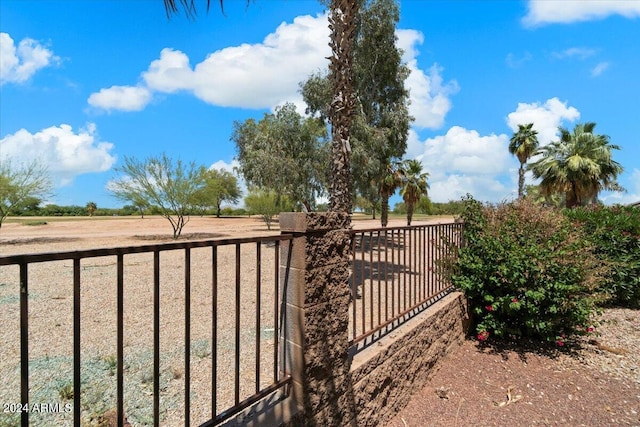 view of gate featuring a rural view