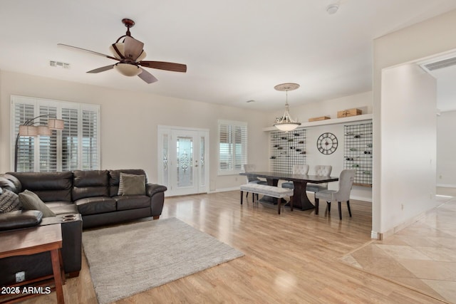 30124 N 174th St, Rio Verde, AZ 85263 - living room with light wood-type flooring, ceiling fan, and baseboards