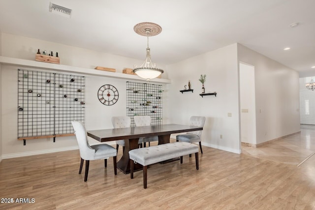 30124 N 174th St, Rio Verde, AZ 85263 - dining area featuring light wood-style floors, a chandelier, baseboards, and recessed lighting