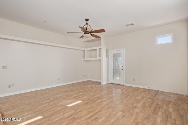 30124 N 174th St, Rio Verde, AZ 85263 - spare room with light wood-style flooring, a ceiling fan, and baseboards