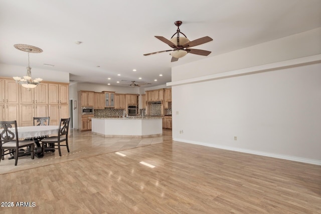 30124 N 174th St, Rio Verde, AZ 85263 - living area featuring ceiling fan, a chandelier, light wood-style floors, recessed lighting, and baseboards