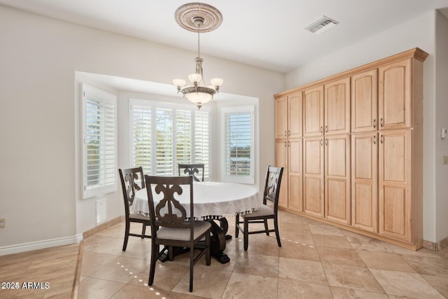30124 N 174th St, Rio Verde, AZ 85263 - dining space with a chandelier, baseboards, and light tile patterned floors