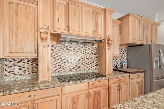 30124 N 174th St, Rio Verde, AZ 85263 - kitchen featuring black electric stovetop, light brown cabinets, tasteful backsplash, and stainless steel fridge
