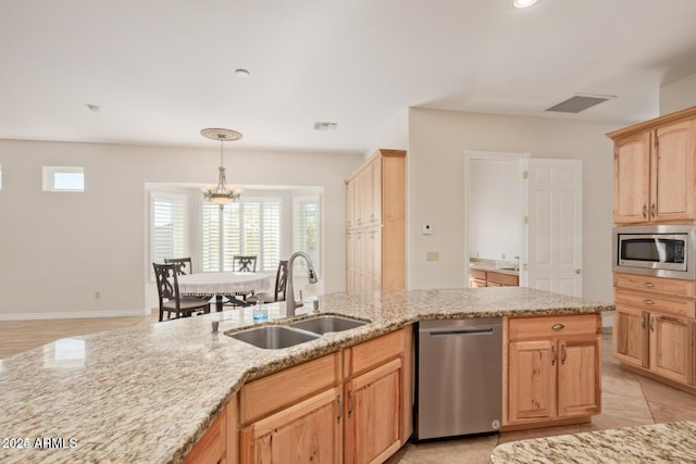 30124 N 174th St, Rio Verde, AZ 85263 - kitchen with a sink, appliances with stainless steel finishes, light brown cabinetry, a chandelier, and light stone counters
