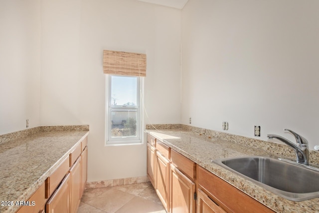 30124 N 174th St, Rio Verde, AZ 85263 - kitchen featuring a sink, light tile patterned floors, and baseboards