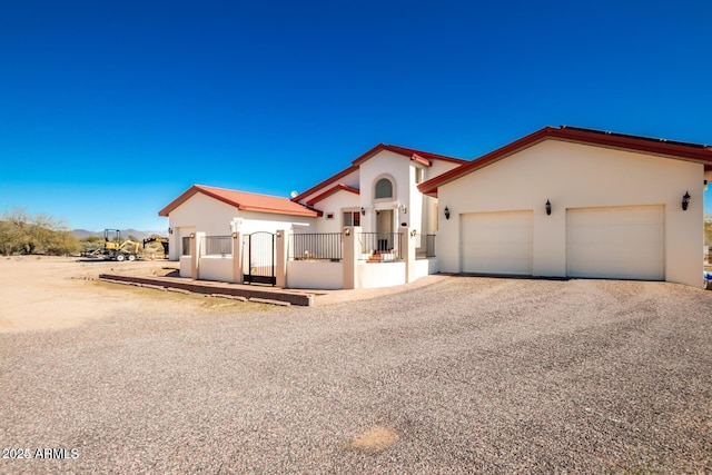 30124 N 174th St, Rio Verde, AZ 85263 - mediterranean / spanish-style house featuring stucco siding, a garage, and driveway