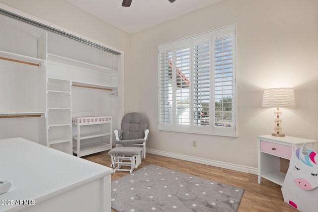30124 N 174th St, Rio Verde, AZ 85263 - bedroom featuring baseboards, wood finished floors, a closet, and ceiling fan