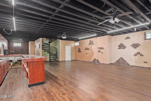 30124 N 174th St, Rio Verde, AZ 85263 - basement with stairway, dark wood-style flooring, ceiling fan, and plenty of natural light