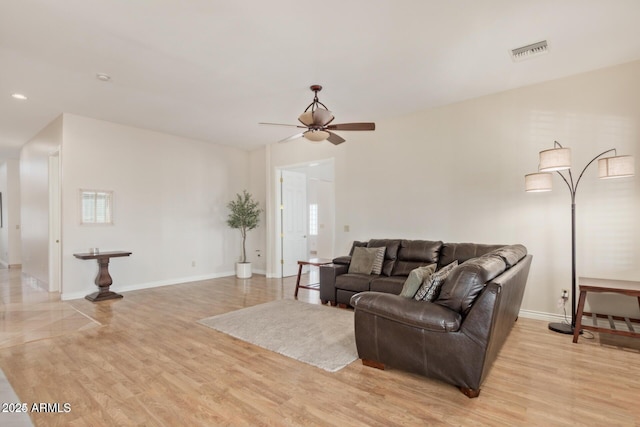 30124 N 174th St, Rio Verde, AZ 85263 - living room featuring a ceiling fan, light wood-type flooring, baseboards, and recessed lighting