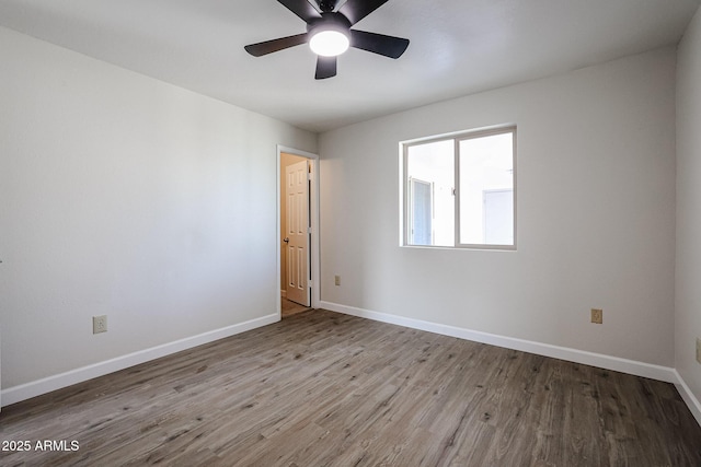 empty room with light hardwood / wood-style floors and ceiling fan