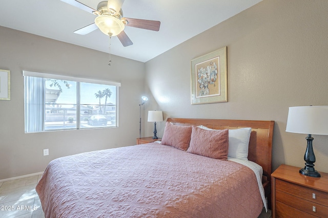 bedroom with baseboards and ceiling fan