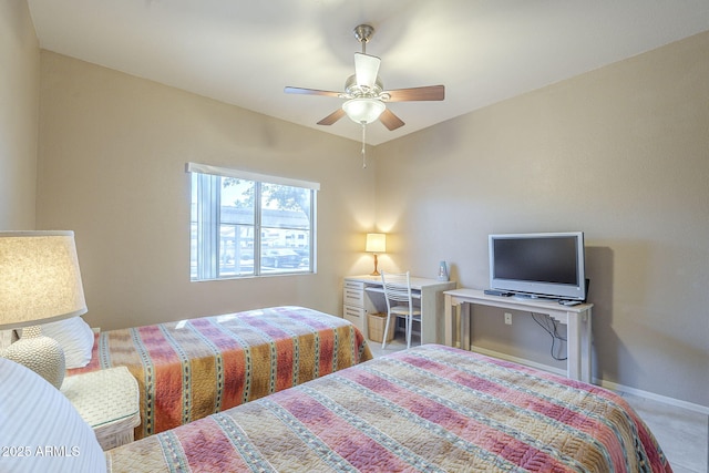 bedroom featuring baseboards, carpet, and ceiling fan