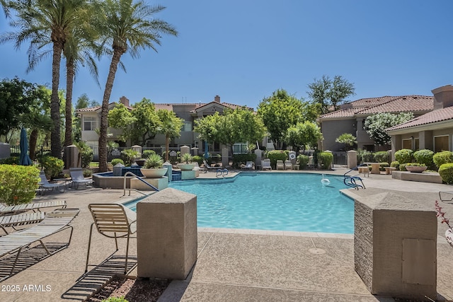 pool with a patio