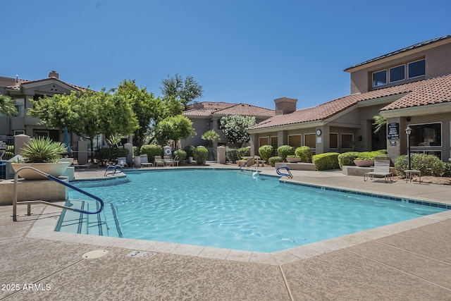 community pool featuring a patio