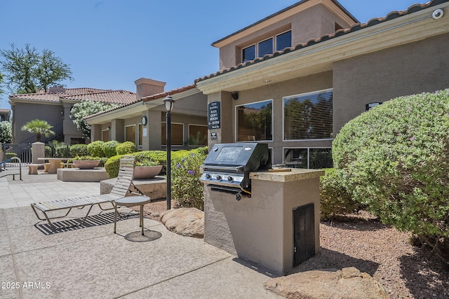 view of patio / terrace with a grill