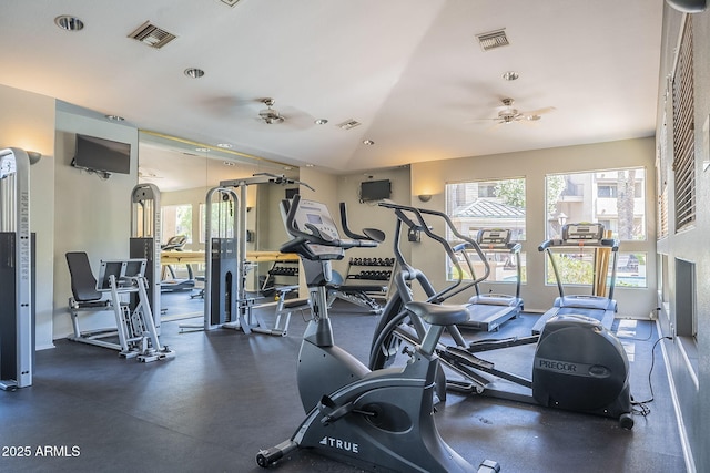 workout area featuring ceiling fan and visible vents