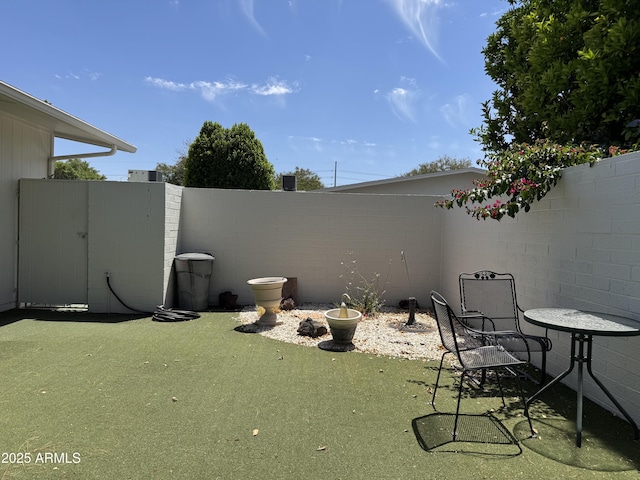 view of patio / terrace with fence