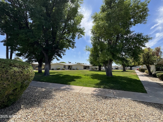 view of front facade featuring a front yard