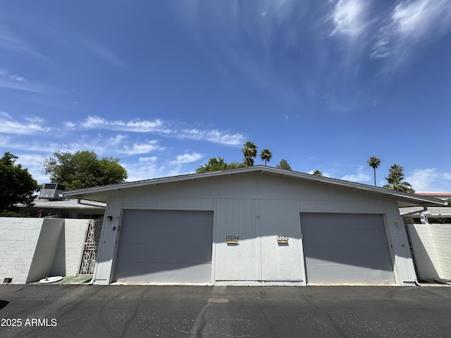 view of home's exterior featuring an outbuilding