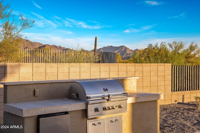 24779 N 91st St, Scottsdale, AZ 85255 - view of patio / terrace featuring grilling area, a mountain view, and fence
