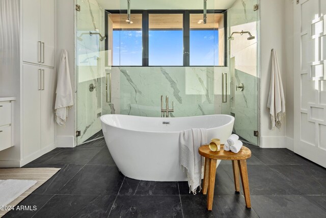 24779 N 91st St, Scottsdale, AZ 85255 - full bath featuring a marble finish shower, a freestanding bath, and baseboards
