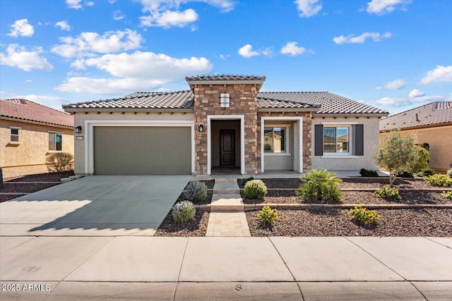 mediterranean / spanish-style house with a garage