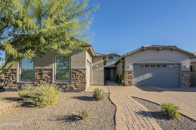 view of front of property featuring a garage