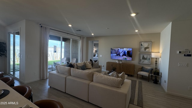 living room featuring light wood-type flooring