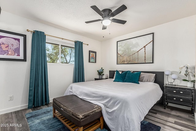 325 E Harmony Ave, Mesa, AZ 85210 - bedroom with wood finished floors, a ceiling fan, and a textured ceiling