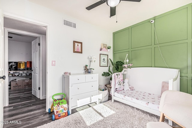 325 E Harmony Ave, Mesa, AZ 85210 - bedroom with dark wood finished floors and a ceiling fan