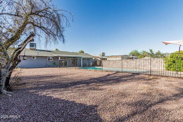 325 E Harmony Ave, Mesa, AZ 85210 - rear view of property featuring a patio area