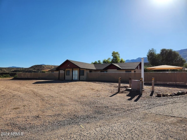 view of front of home with a mountain view