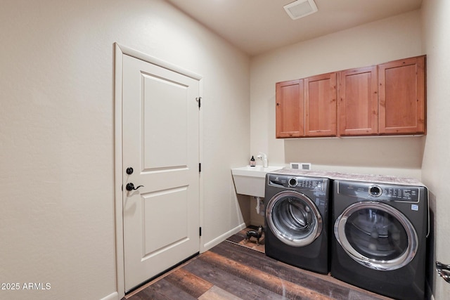 1604 W Beech Pkwy, Payson, AZ 85541 - laundry room with washer and dryer, dark wood-type flooring, cabinet space, and baseboards