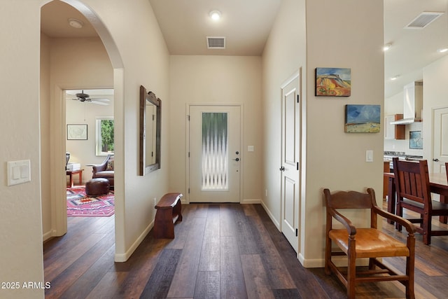 1604 W Beech Pkwy, Payson, AZ 85541 - entrance foyer featuring dark wood-type flooring, arched walkways, a ceiling fan, and baseboards