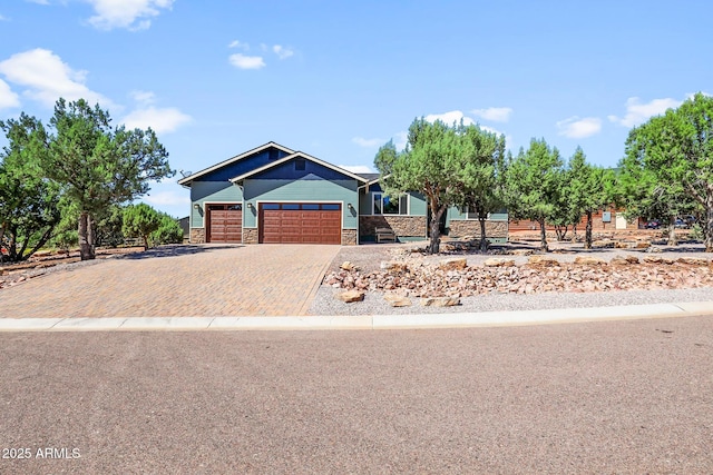 1604 W Beech Pkwy, Payson, AZ 85541 - view of front of property with an attached garage, stone siding, and decorative driveway