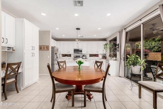 dining space featuring light tile patterned floors, visible vents, recessed lighting, and a ceiling fan