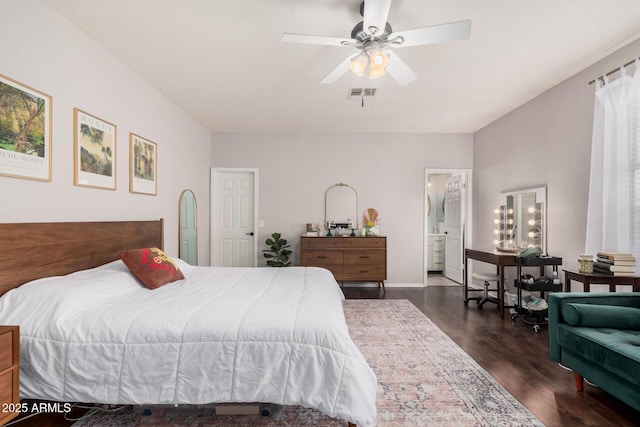 bedroom with ceiling fan, visible vents, and dark wood-style floors